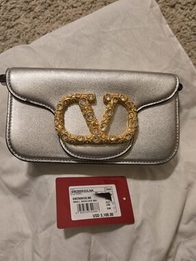 Valentino Garavani Metallic Silver Shoulder Bag with Gold VLogo. No Strap